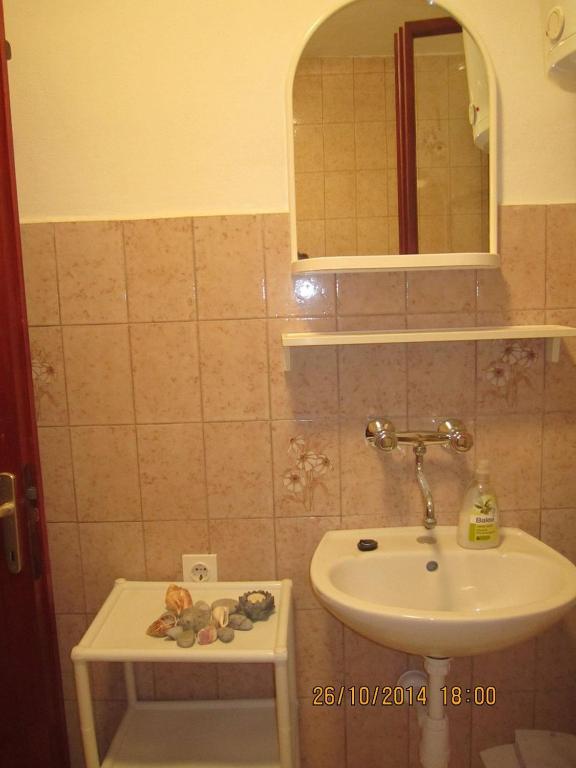 Kúpeľňa v ubytovaní Apartments Deni