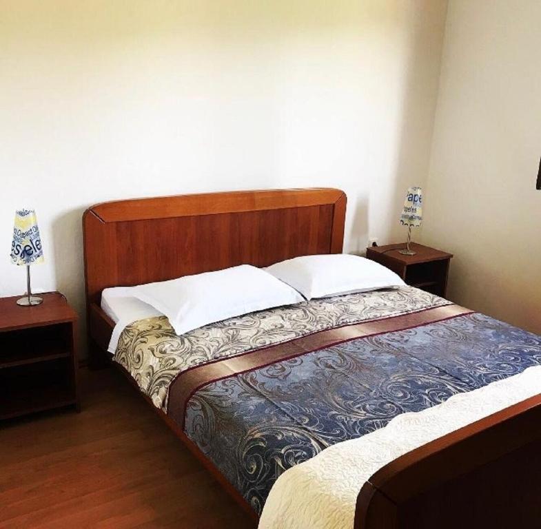 Posteľ alebo postele v izbe v ubytovaní Apartments Deni