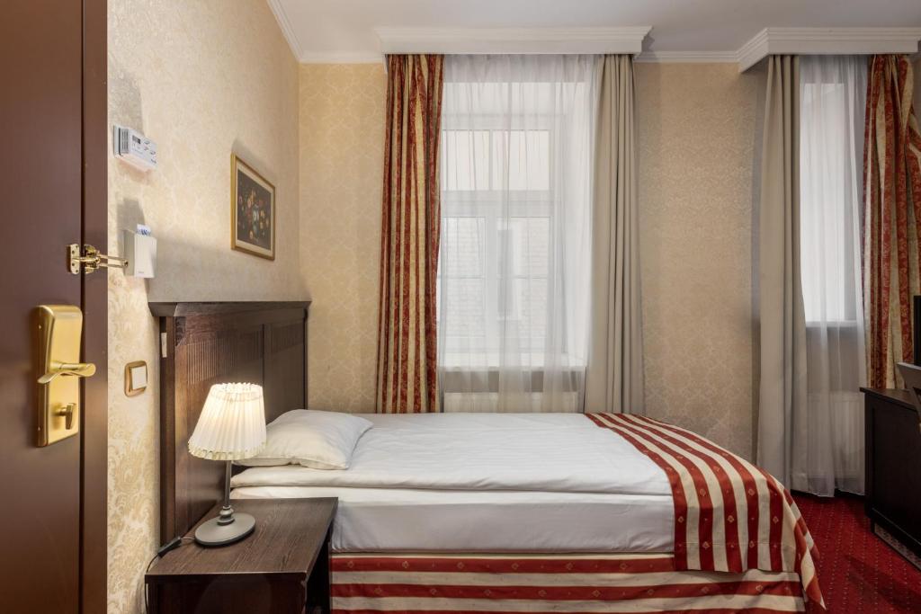 Gulta vai gultas numurā naktsmītnē Gertrude Hotel self check-in