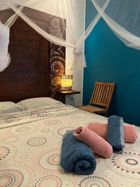 Postel nebo postele na pokoji v ubytování Villa Piscine - Maracudja