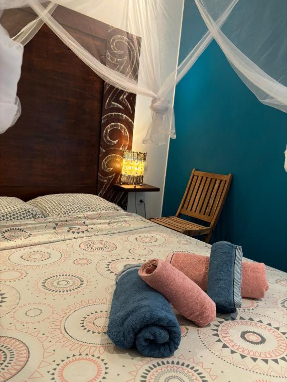 Postel nebo postele na pokoji v ubytování Villa Piscine - Maracudja