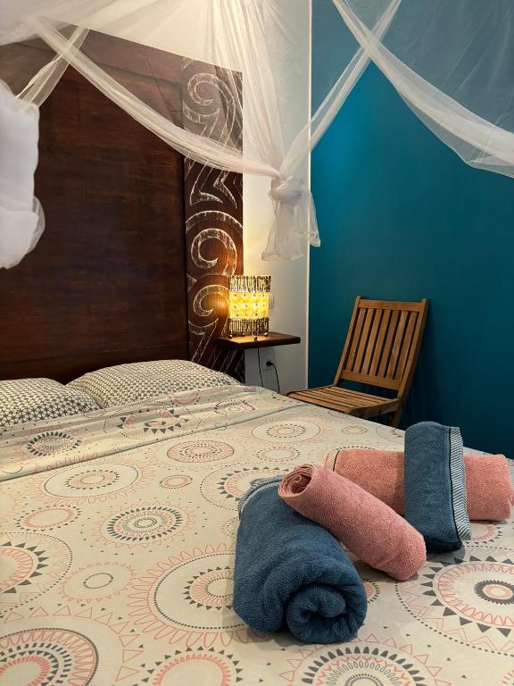 Postel nebo postele na pokoji v ubytování Villa Piscine - Maracudja