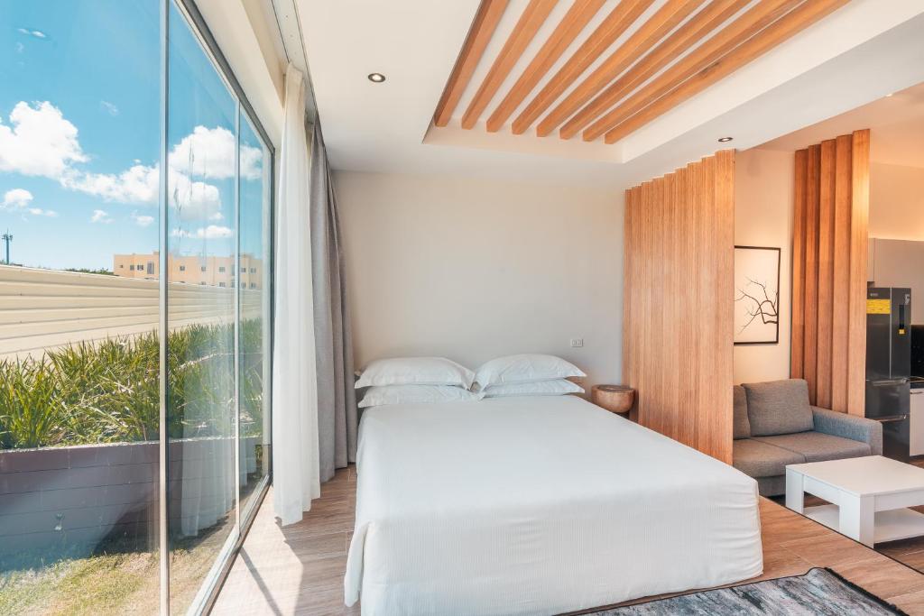 Postel nebo postele na pokoji v ubytování Probar Suites Punta Cana