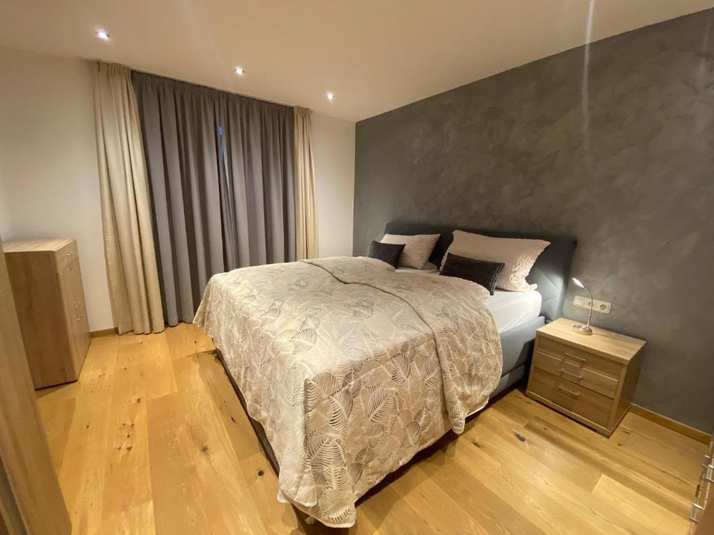 Katil atau katil-katil dalam bilik di GondelApart Ski in Ski out