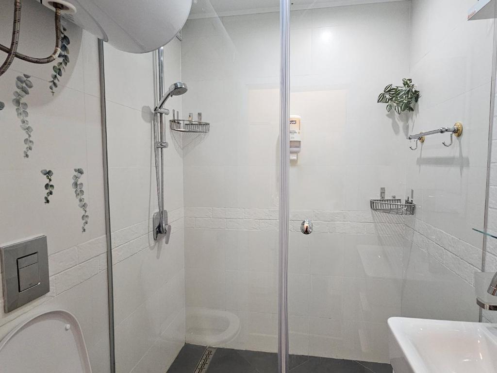 Koupelna v ubytování Bright Inn - Holiday & Business Apartment