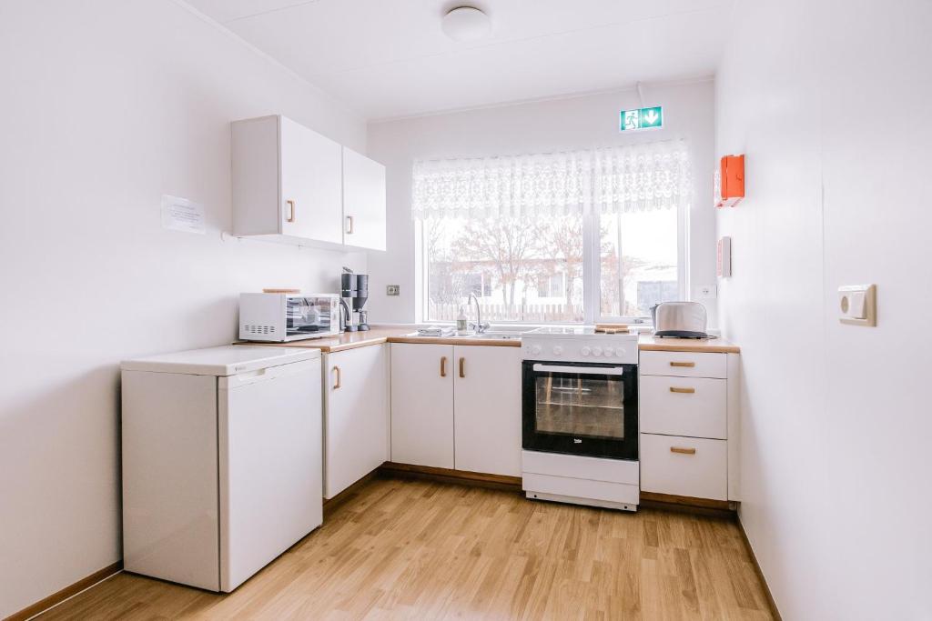 Kuchyň nebo kuchyňský kout v ubytování Eldá apartments