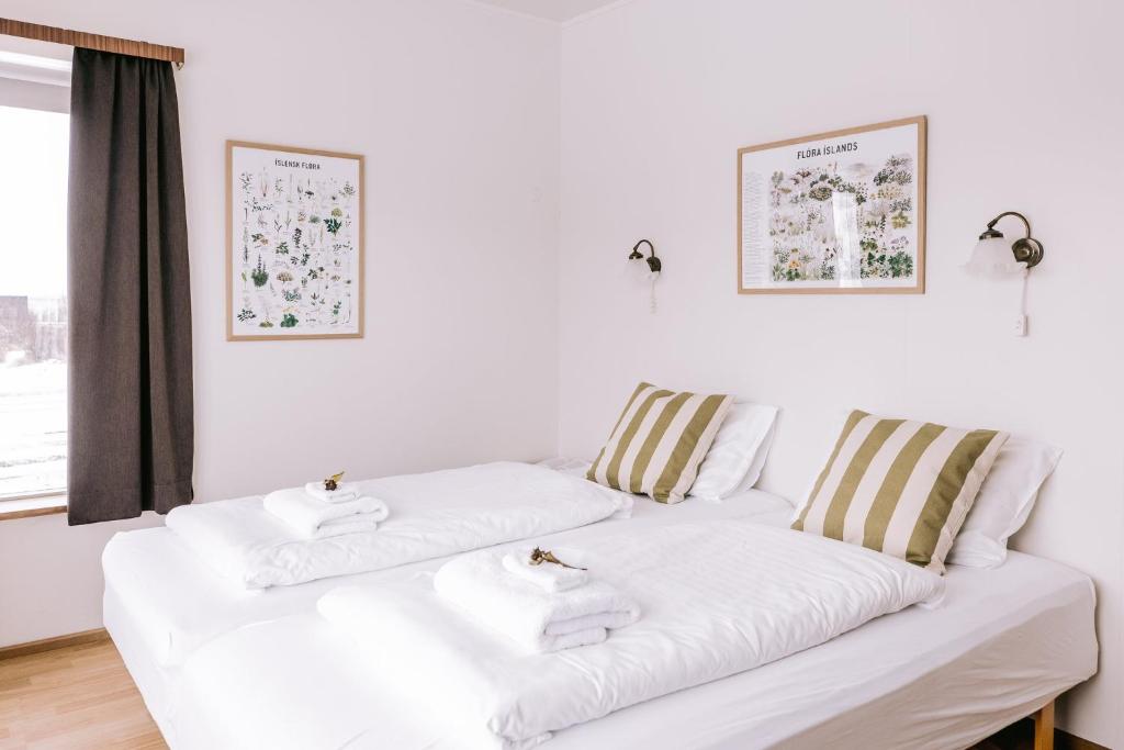 Postel nebo postele na pokoji v ubytování Eldá apartments