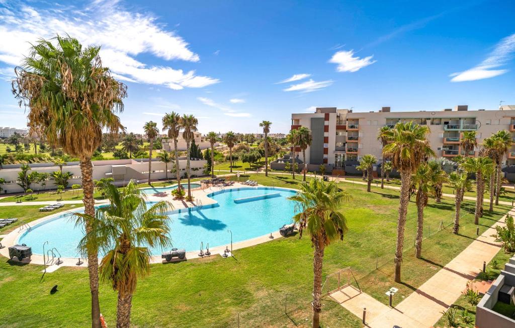 Πισίνα στο ή κοντά στο Cozy Apartment In Almerimar With Wifi
