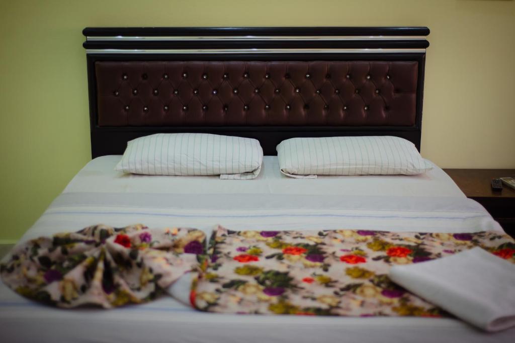 Postel nebo postele na pokoji v ubytování Nile sky hotel and suites