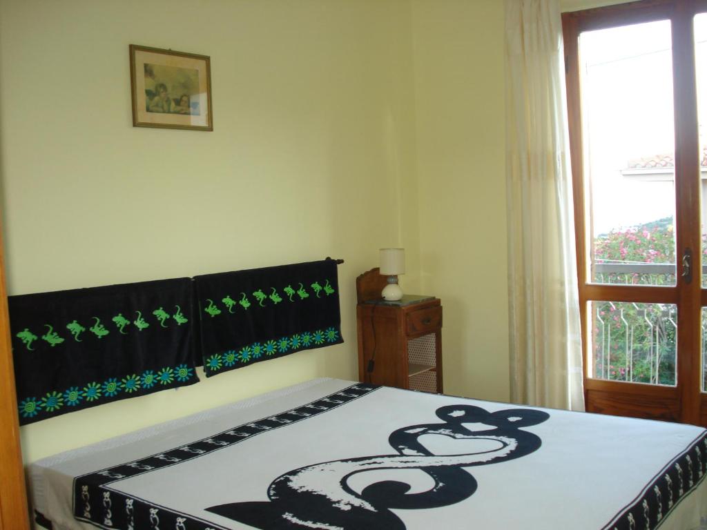 Posteľ alebo postele v izbe v ubytovaní Casa Degli Oleandri Sul Cortile R6314