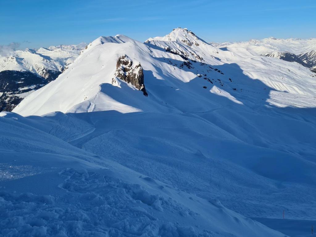 FeWo D'Rock Arosa- center of nightlife by Nature Apartments Switzerland v zimě