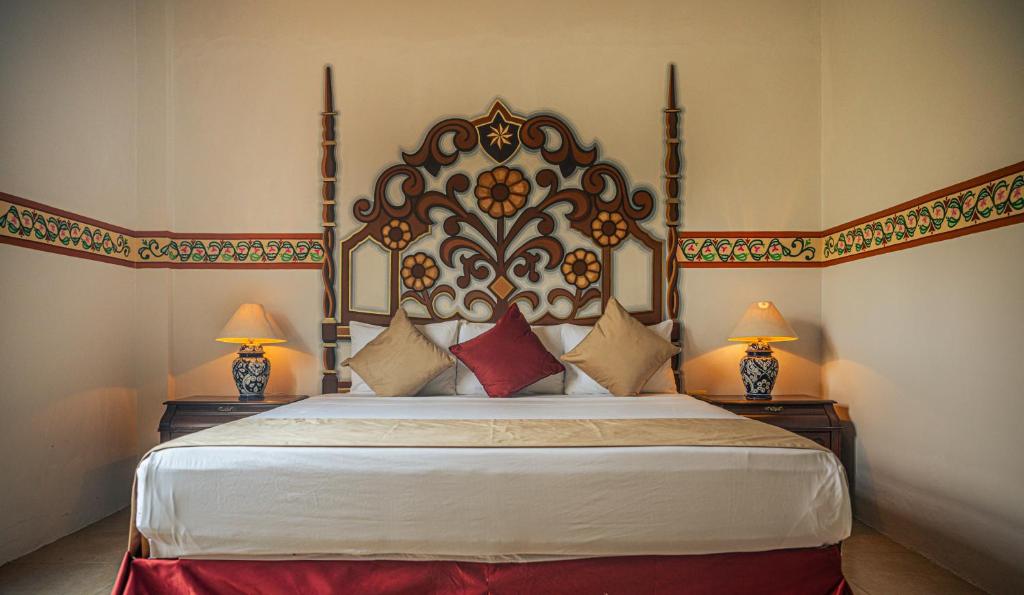 Postel nebo postele na pokoji v ubytování Hotel Montecillo