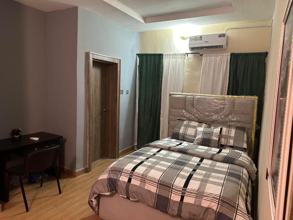 Ένα ή περισσότερα κρεβάτια σε δωμάτιο στο Miraph Apartment II