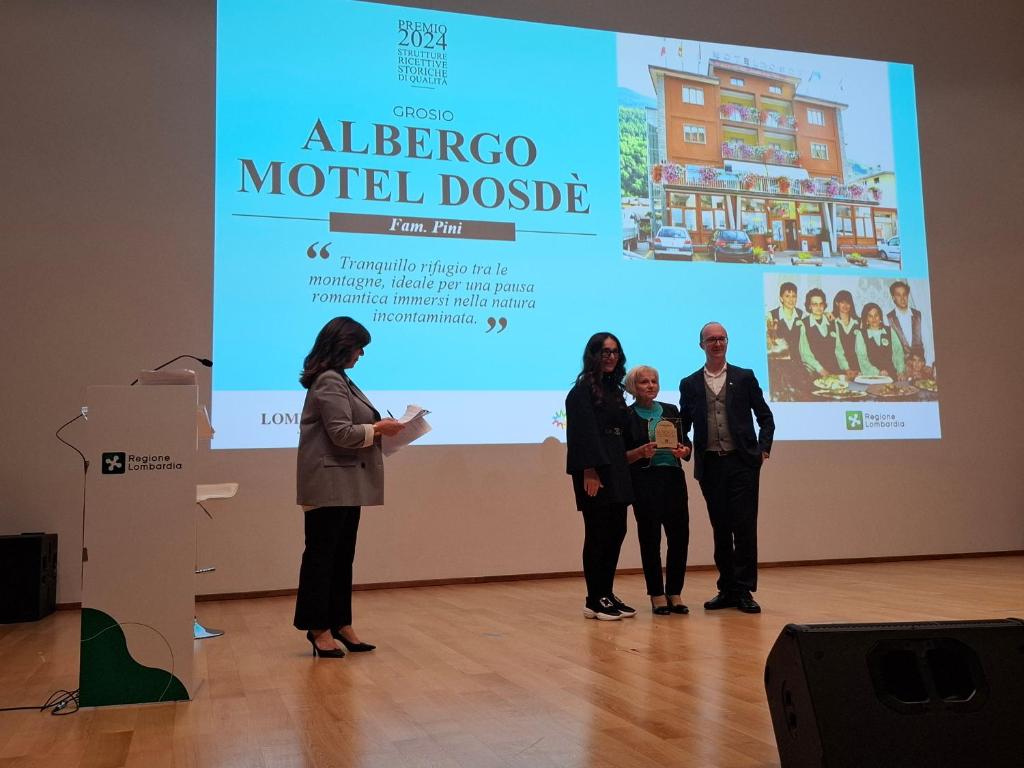 Un certificado, premio, letrero u otro documento en Albergo Motel Dosdè B&B