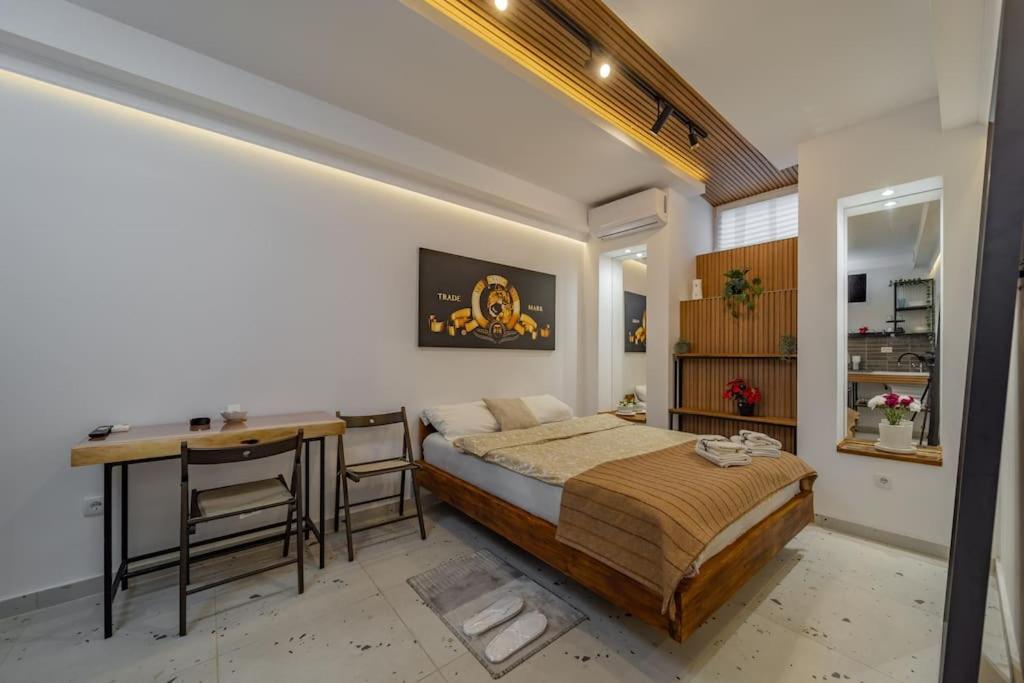Postel nebo postele na pokoji v ubytování Keti Zemun Spa Apartment