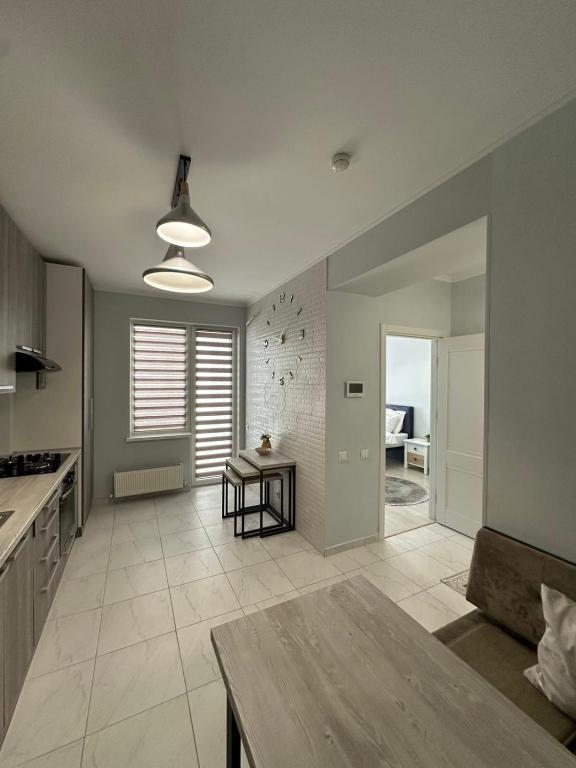 Una cocina o cocineta en ApartDirect Botanica 1