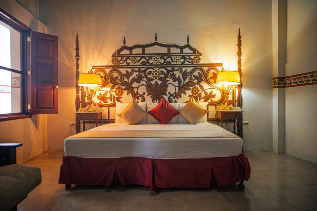 Postel nebo postele na pokoji v ubytování Hotel Montecillo