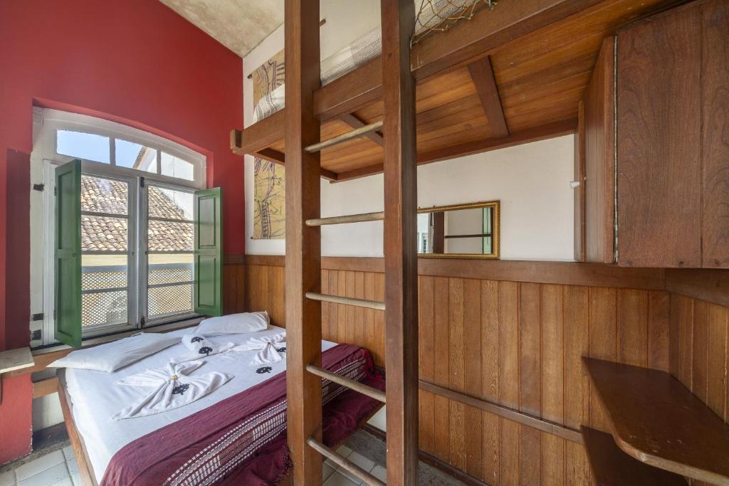 Postel nebo postele na pokoji v ubytování Laranjeiras Hostel