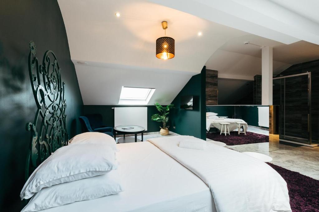 Postel nebo postele na pokoji v ubytování Hotel Riad Nour