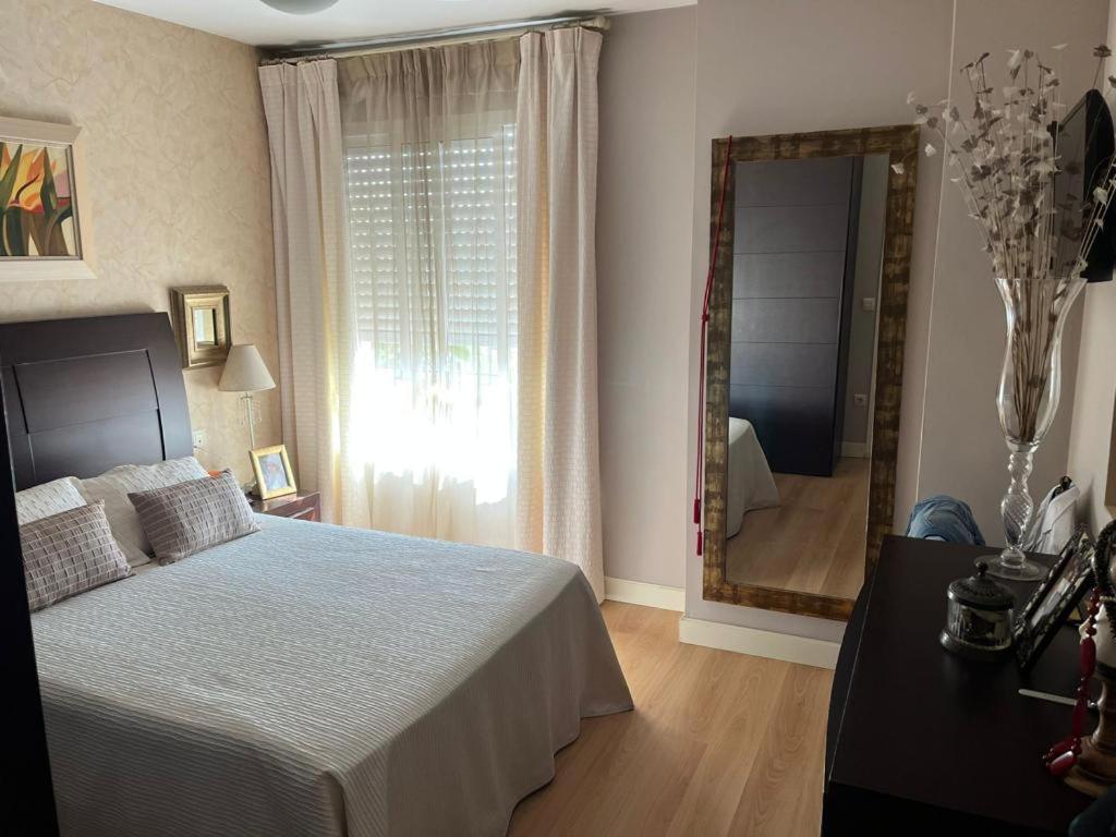 Postel nebo postele na pokoji v ubytování Plaza Apartment Parking Free