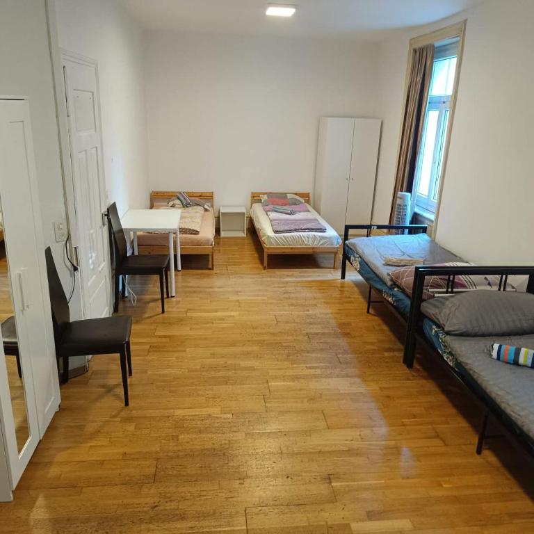 Postel nebo postele na pokoji v ubytování City Home Zurich