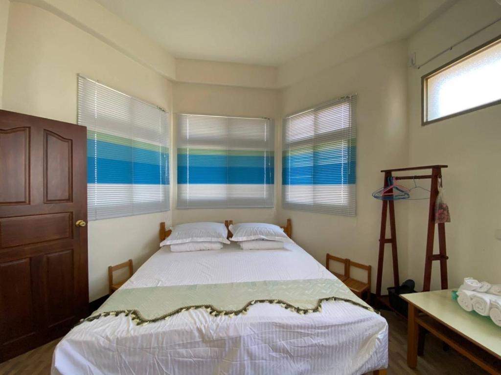 Postel nebo postele na pokoji v ubytování Puchin Homestay