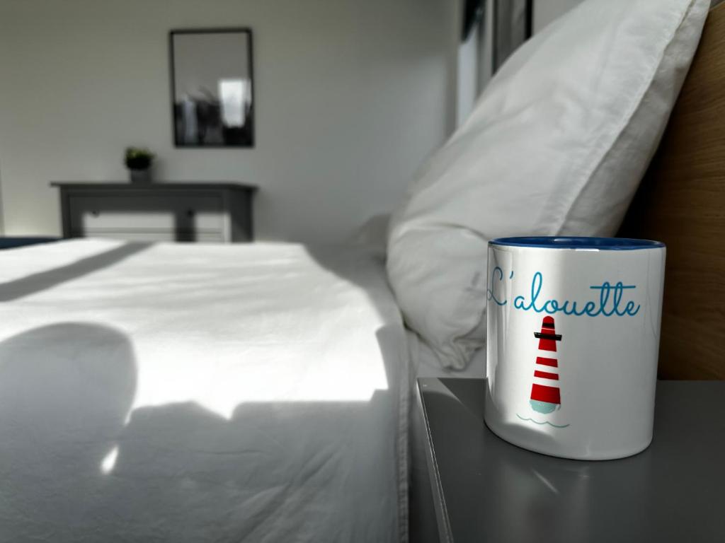 Postel nebo postele na pokoji v ubytování À700m de la mer appartement avec terrasse, parking l'alouette