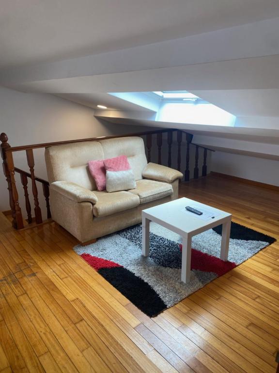 Posezení v ubytování Atico en el casco histórico