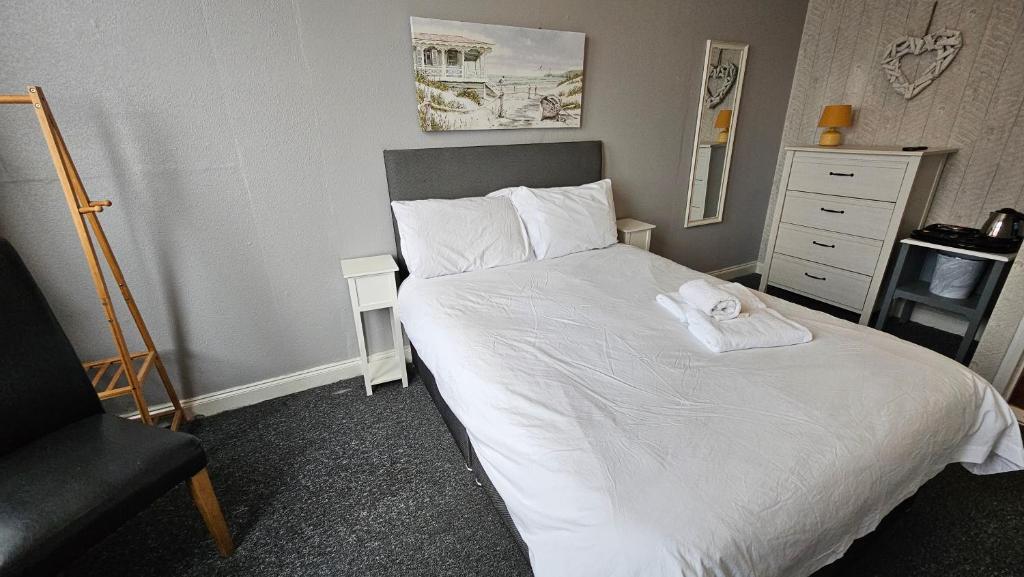 Postel nebo postele na pokoji v ubytování Bowies Lodge