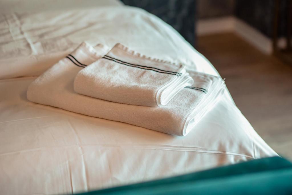 Postel nebo postele na pokoji v ubytování Hotel Valbor