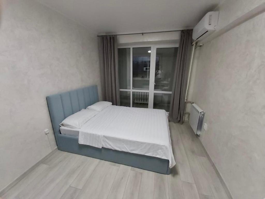 Llit o llits en una habitació de Атакент
