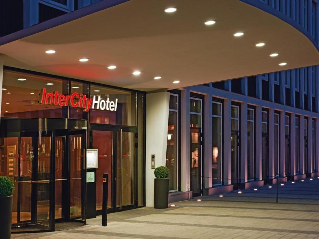 an entrance to a library building with a sign on it at IntercityHotel Hannover in Hannover