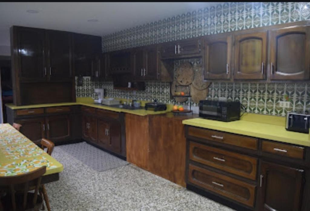 Kuchyň nebo kuchyňský kout v ubytování Linda y céntrica habitación