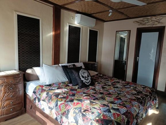 Postel nebo postele na pokoji v ubytování Lombok Sunset Hideaway