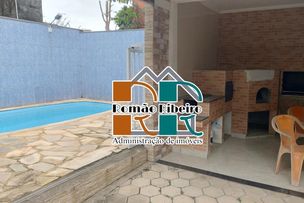 une villa avec une piscine à vendre en roma alphabet dans l'établissement Casa Temporada em Ubatuba Piscina, à Ubatuba