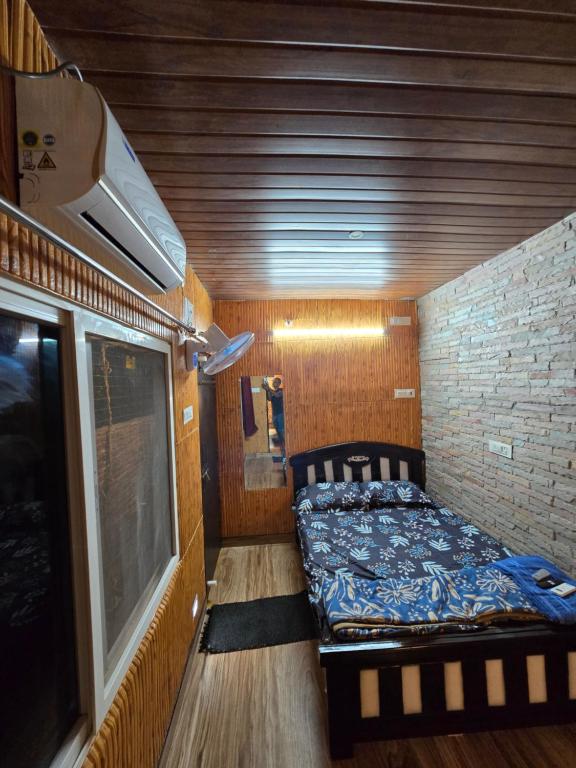 Postel nebo postele na pokoji v ubytování Barla's Home Stay