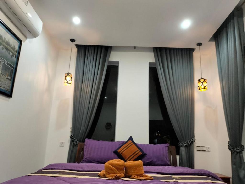 Postel nebo postele na pokoji v ubytování Davyta House