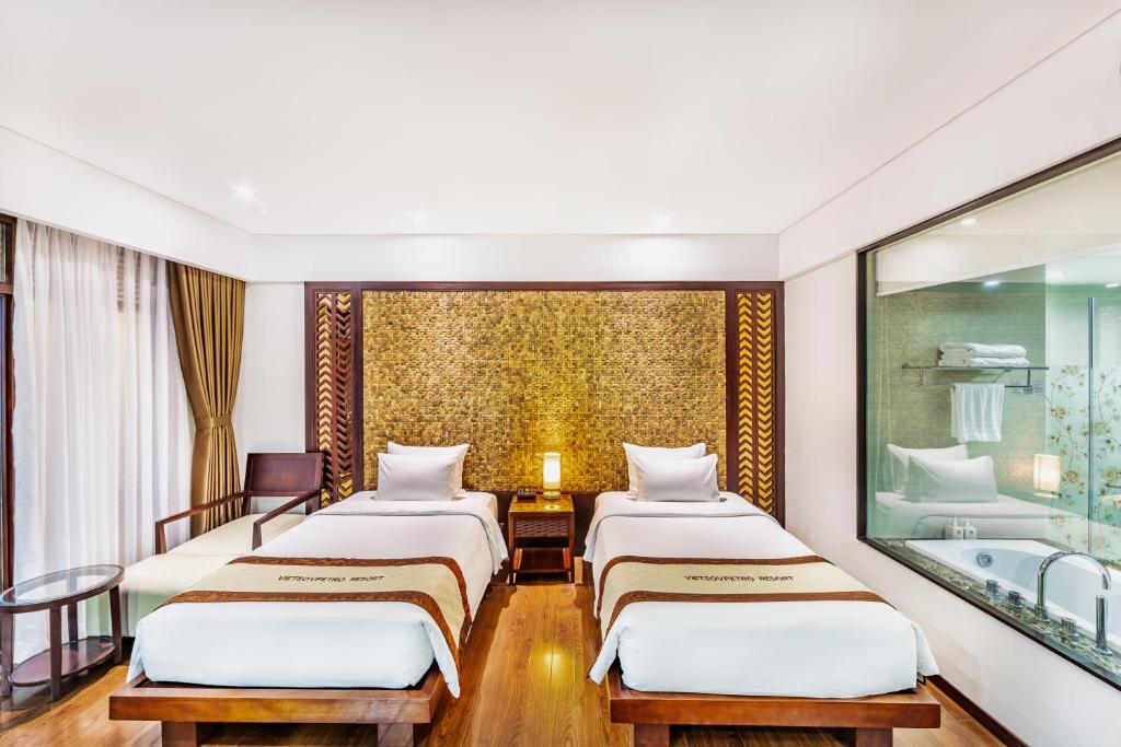 Phòng Deluxe 2 Giường Đơn có Ban công và Nhìn ra Biển