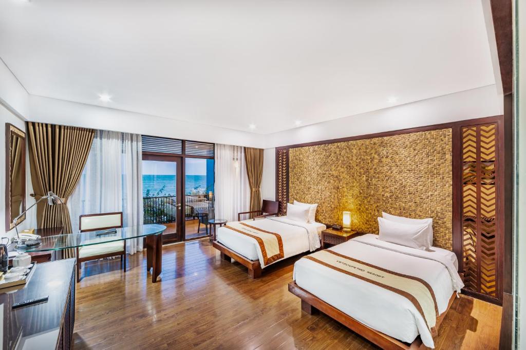 Phòng Deluxe 2 Giường Đơn có Ban công và Nhìn ra Biển