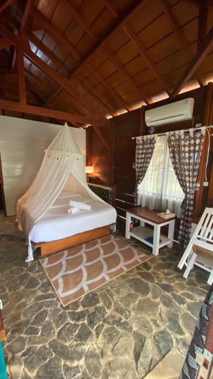 Fotografie z fotogalerie ubytování Oinan Guest House v destinaci Tua Pejat