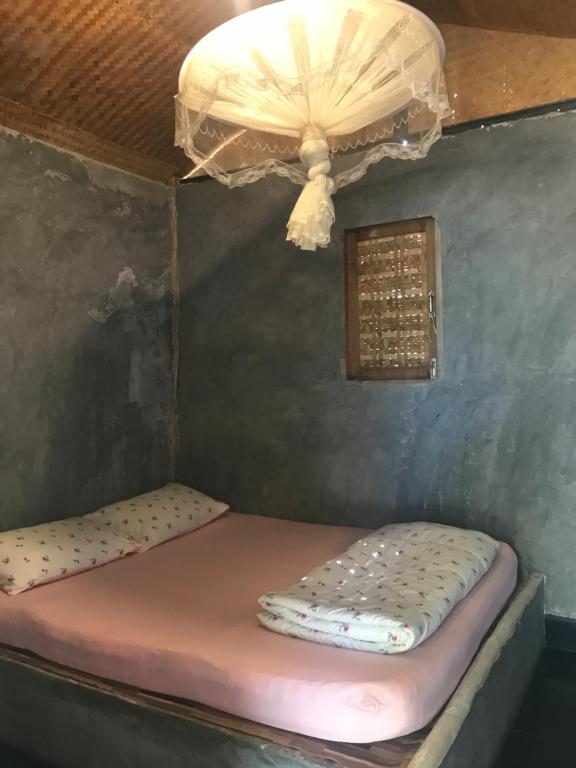 Postel nebo postele na pokoji v ubytování sleepy hut