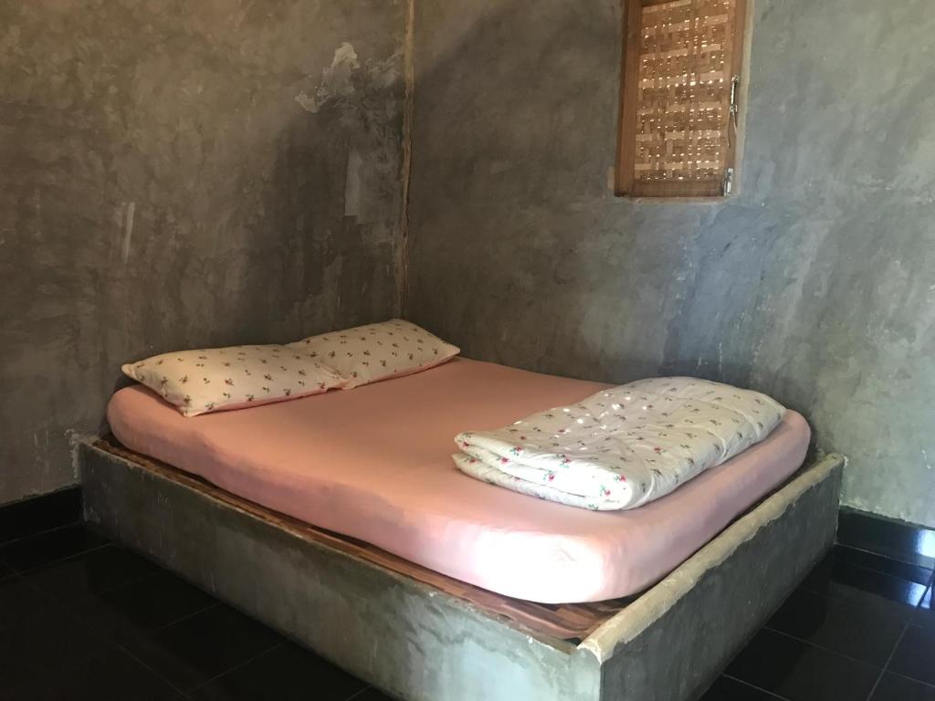 Postel nebo postele na pokoji v ubytování sleepy hut