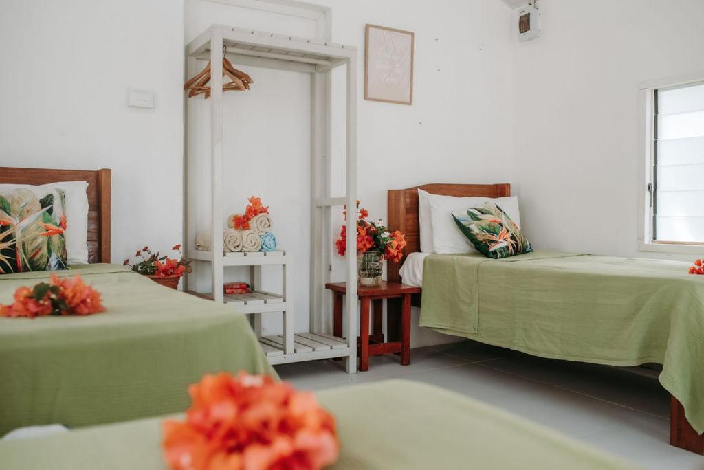 Postel nebo postele na pokoji v ubytování Le Life Resort