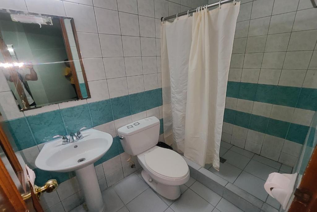Koupelna v ubytování Oftana Suites Cebu near Oakridge