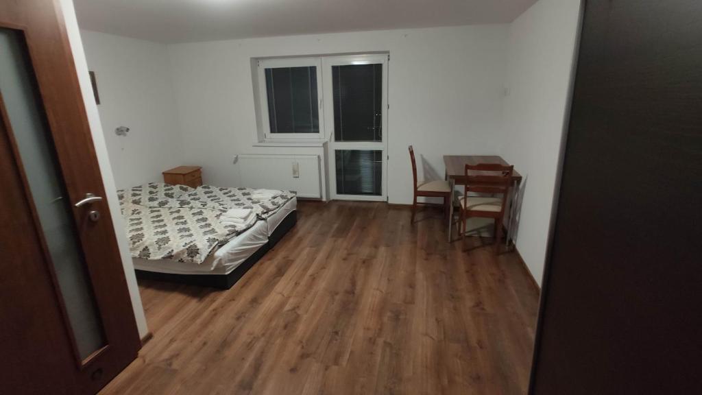 Postel nebo postele na pokoji v ubytování Apartmany Tatra Relax, Velky Slavkov