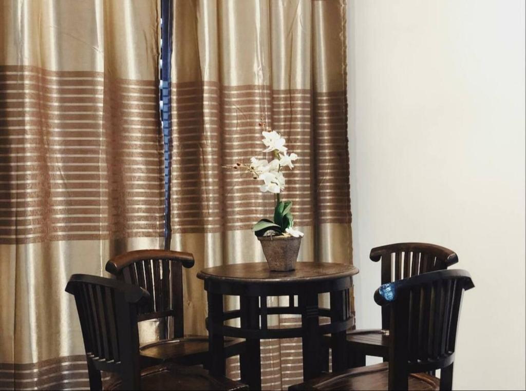 Posezení v ubytování Residence Homestay wakaf Che Yeh