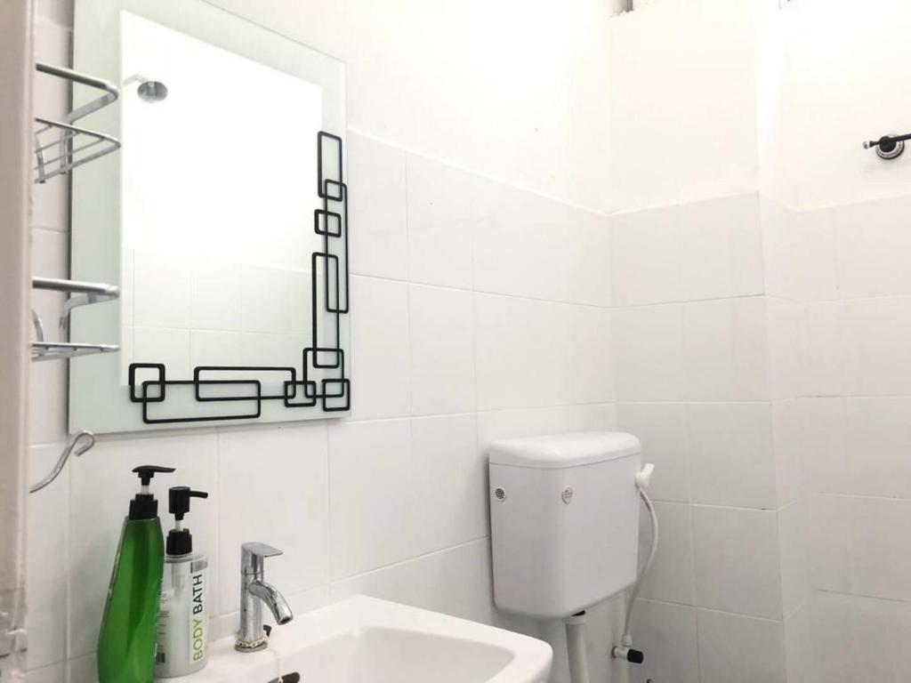 Koupelna v ubytování Residence Homestay wakaf Che Yeh