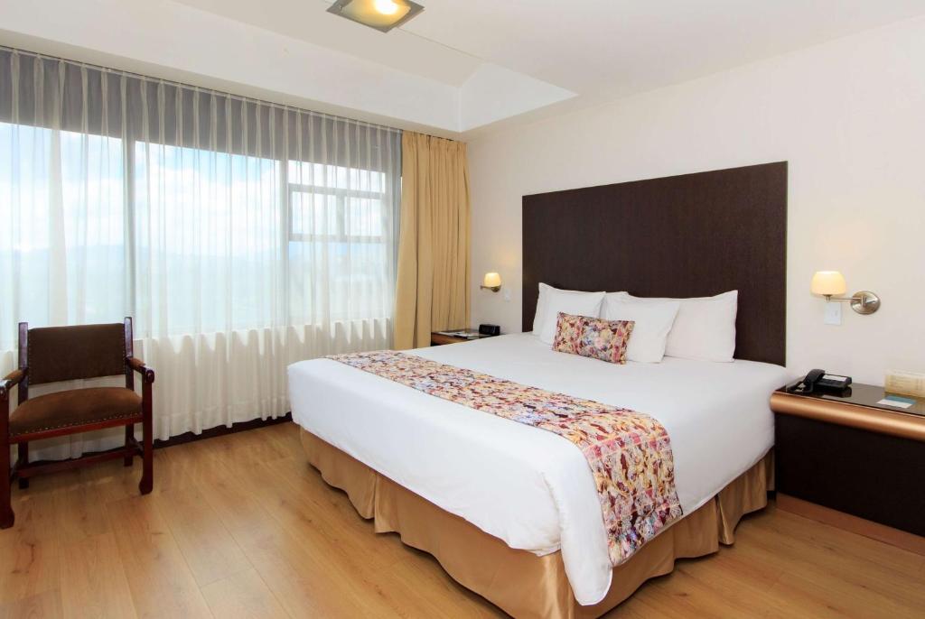 Postel nebo postele na pokoji v ubytování La Quinta by Wyndham Quito
