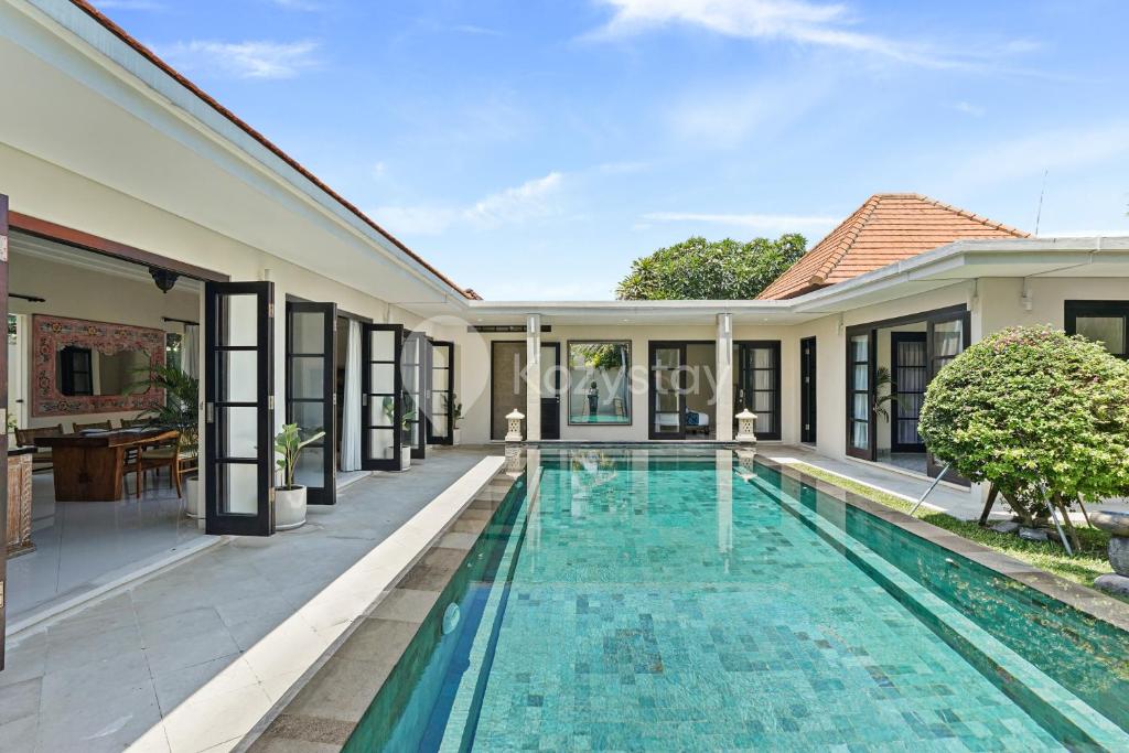 an image of a swimming pool in a villa at Sombra Villa by Kozystay - Sanur in Sanur