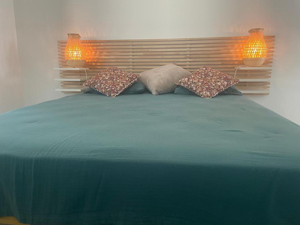 Ένα ή περισσότερα κρεβάτια σε δωμάτιο στο Chambre d'hôte de Sally